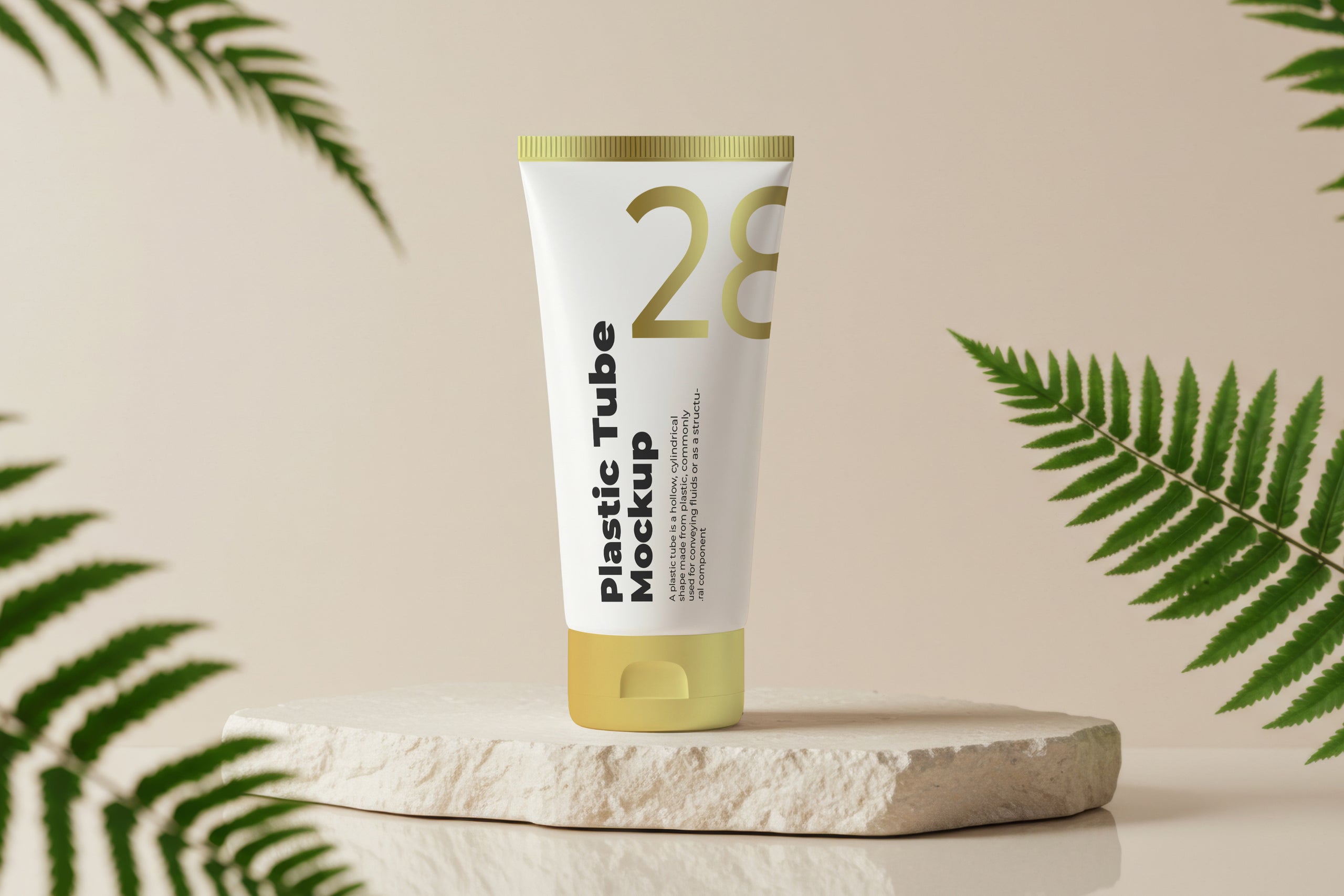 Free plastic tube mockup on stone base with fern leaves