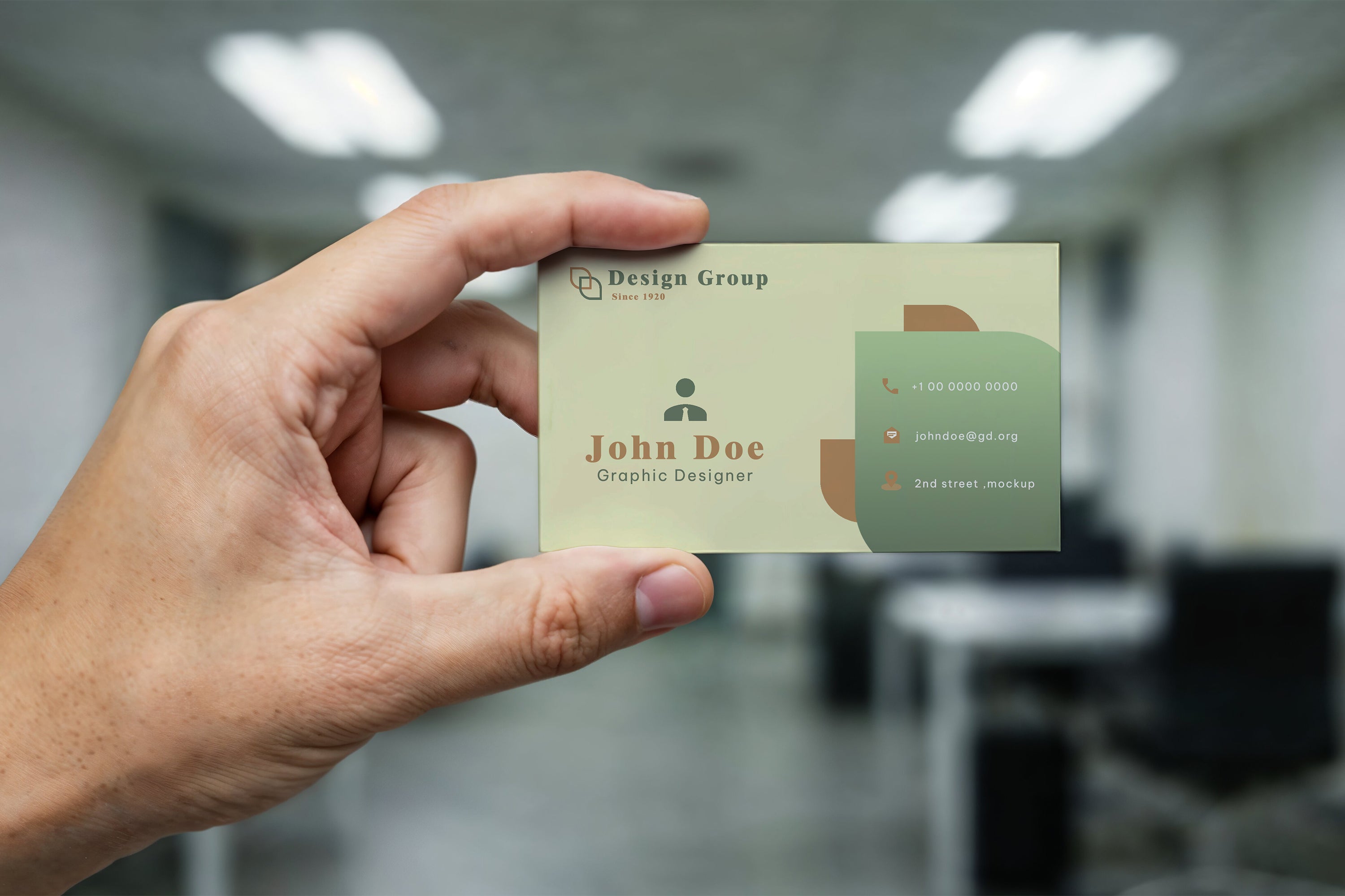 Free Business Card Held in Hand Mockup