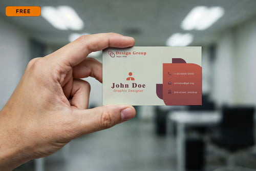 Free Business Card Held in Hand Mockup