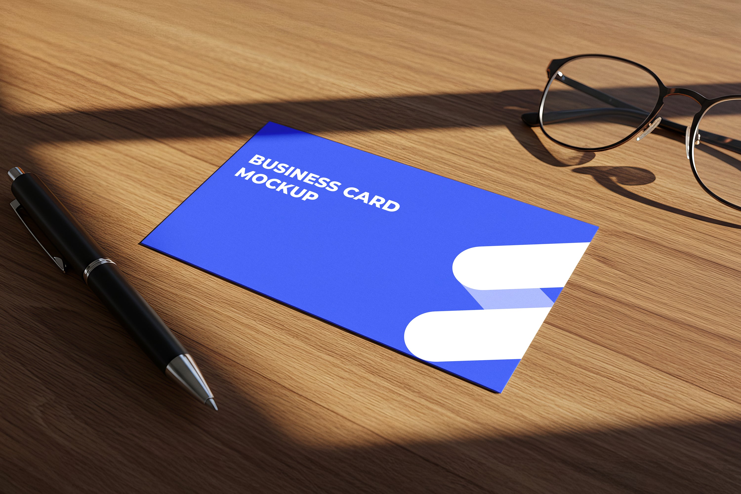Free Business Card on Wooden Desk Mockup