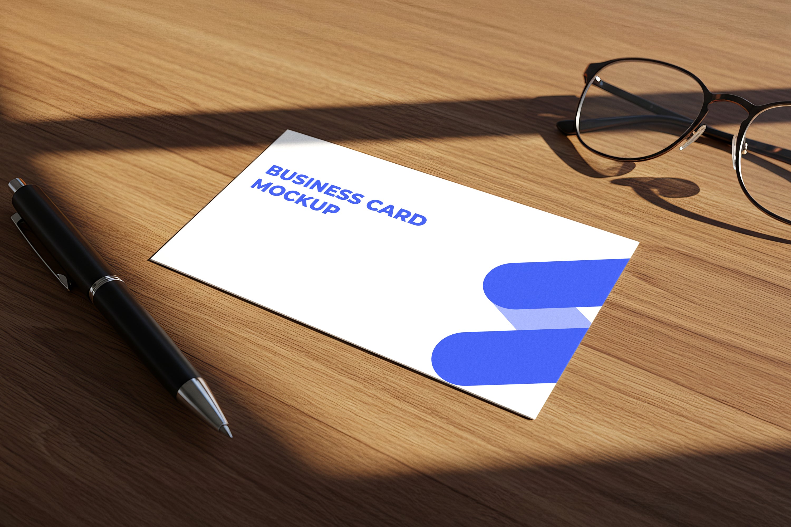 Free Business Card on Wooden Desk Mockup