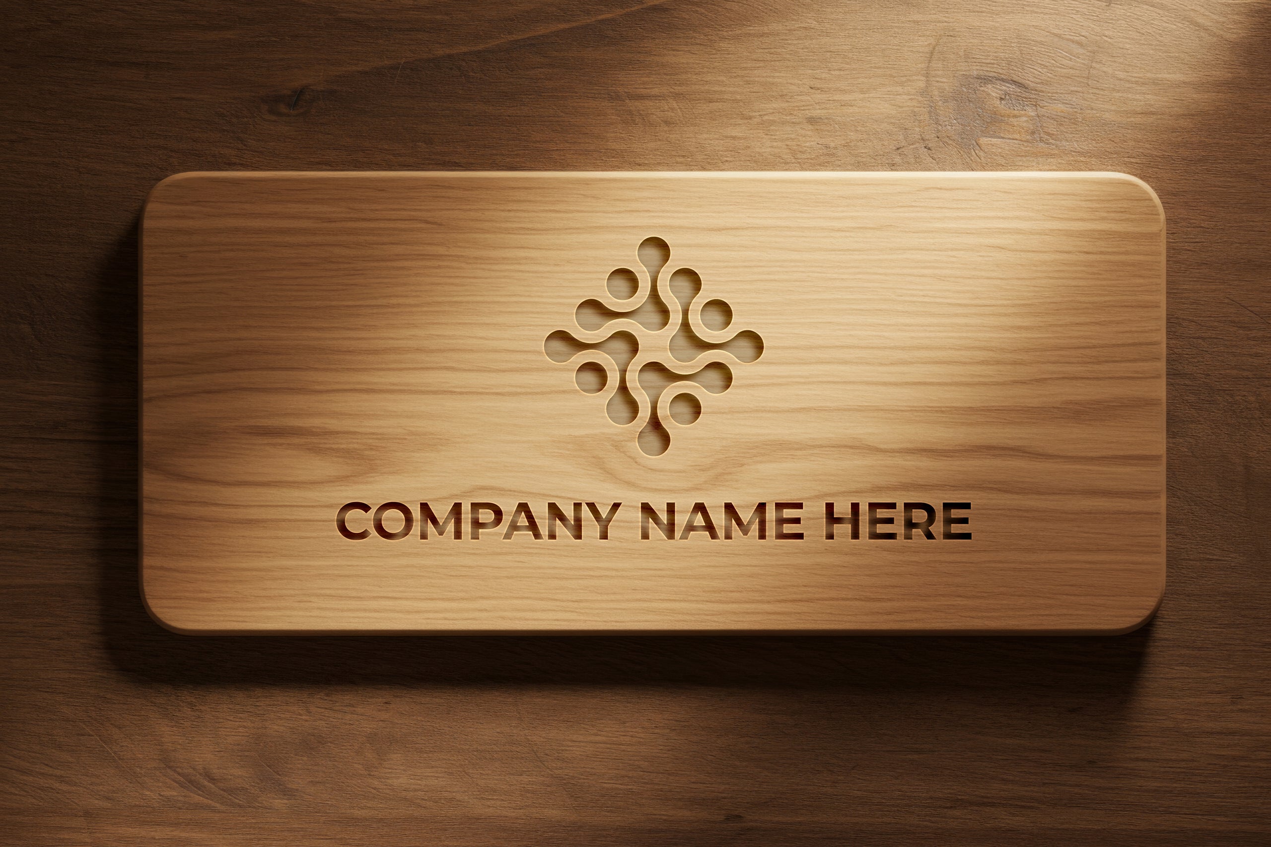 Free engraved logo on wood mockup with carved emblem