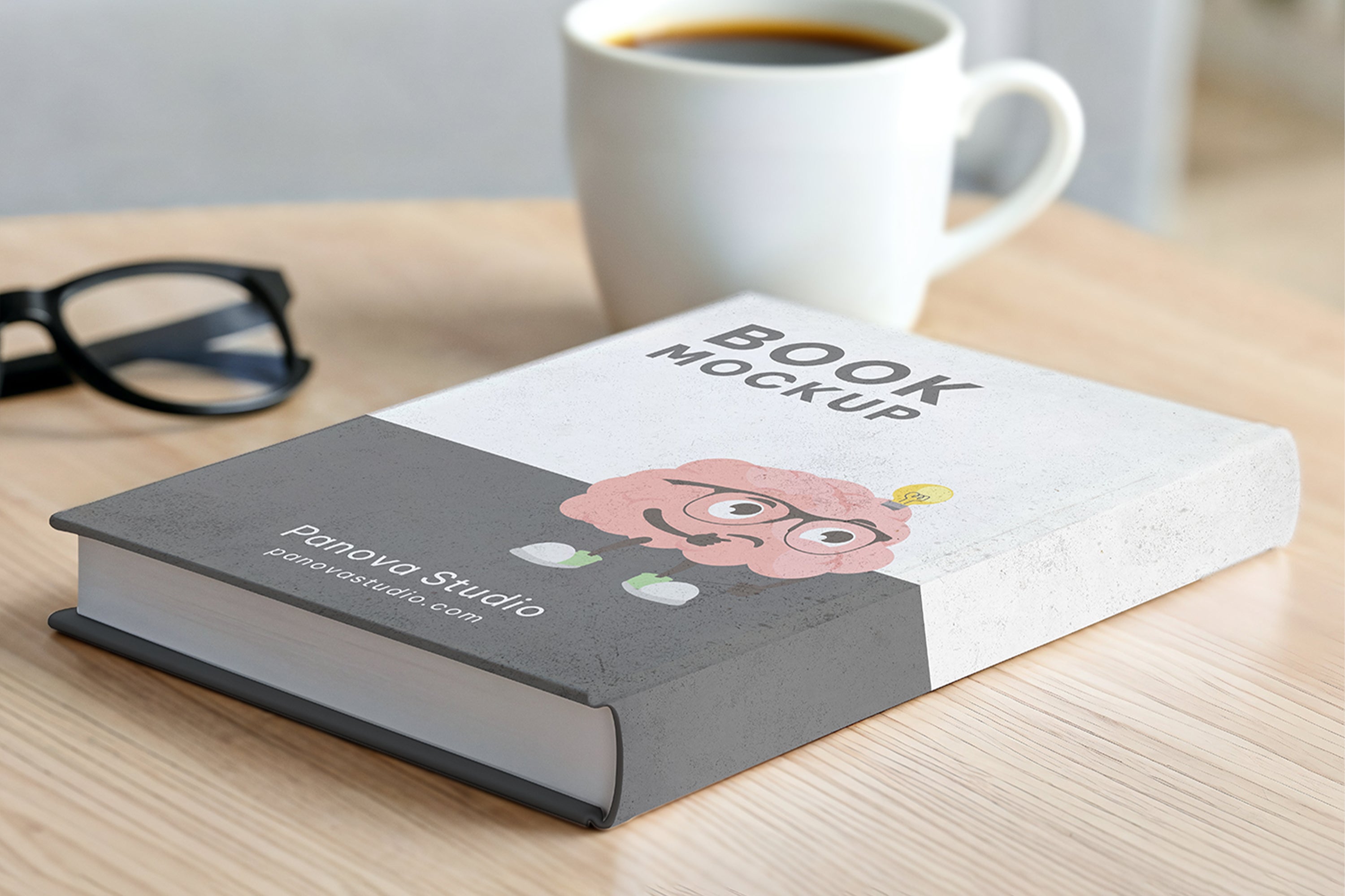 Free Hardcover Book on Table Mockup