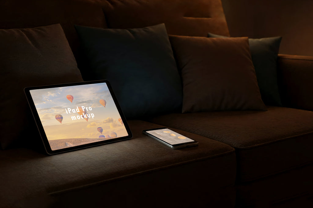 Free Tablet and Phone on Sofa Mockup