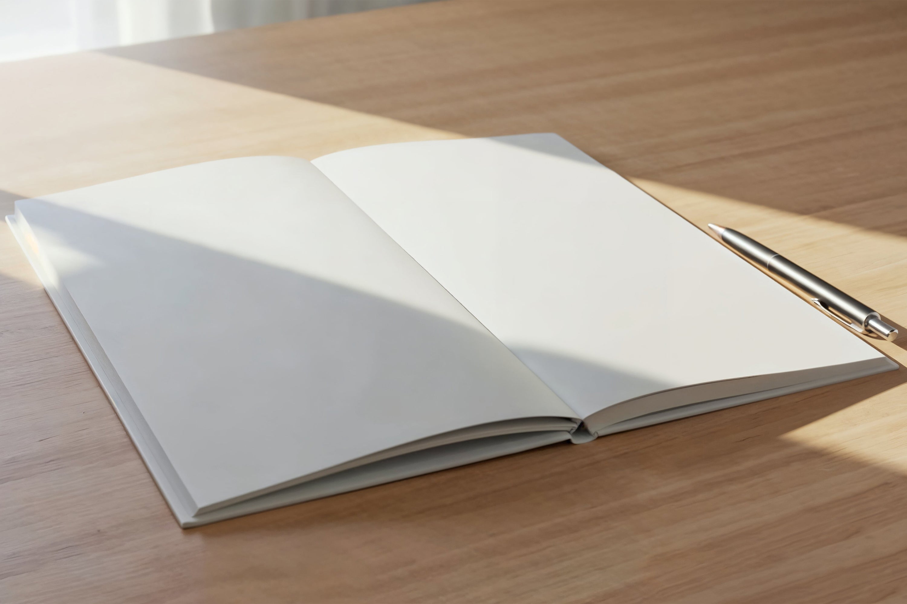 Free Notebook and Pen on Desk Mockup